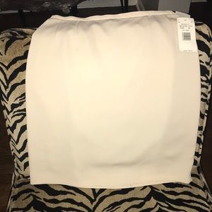 Tan Harve’ Benard skirt by Benard Holtzman